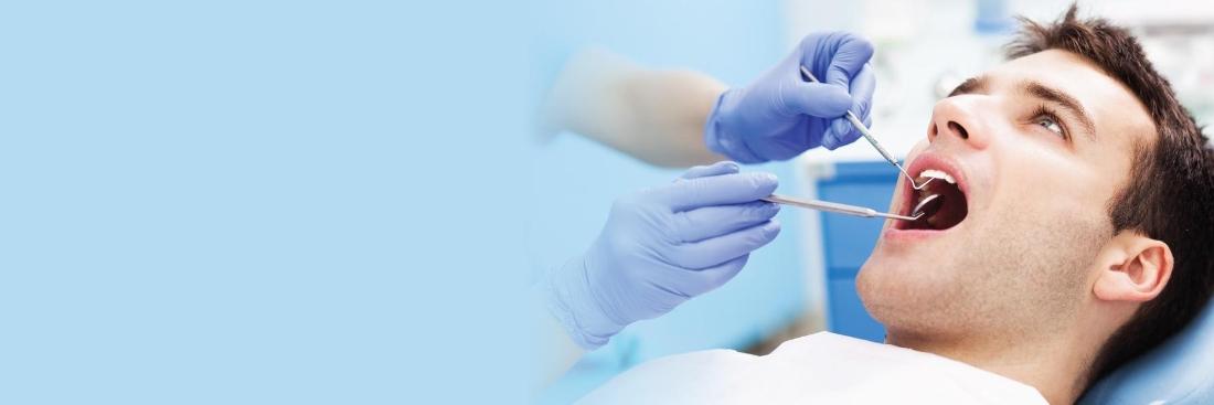 man getting dental cleaning 