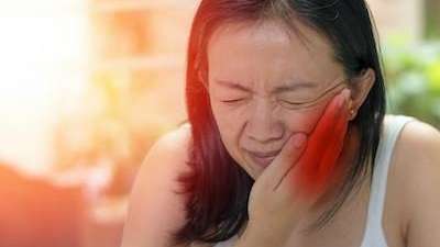 Lady Suffering Jaw Pain
