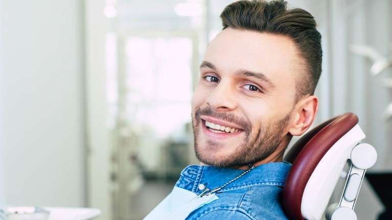 man getting dental bonding in Gretna, LA