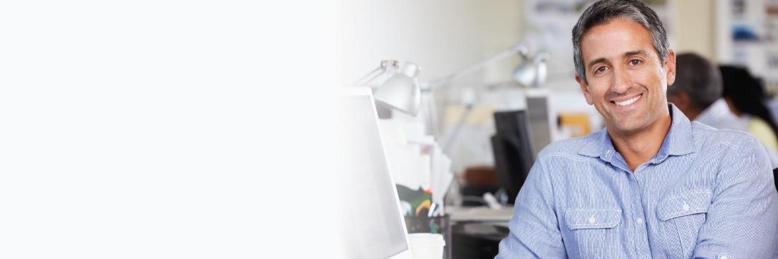 man smiling in office | Dentist Gretna LA