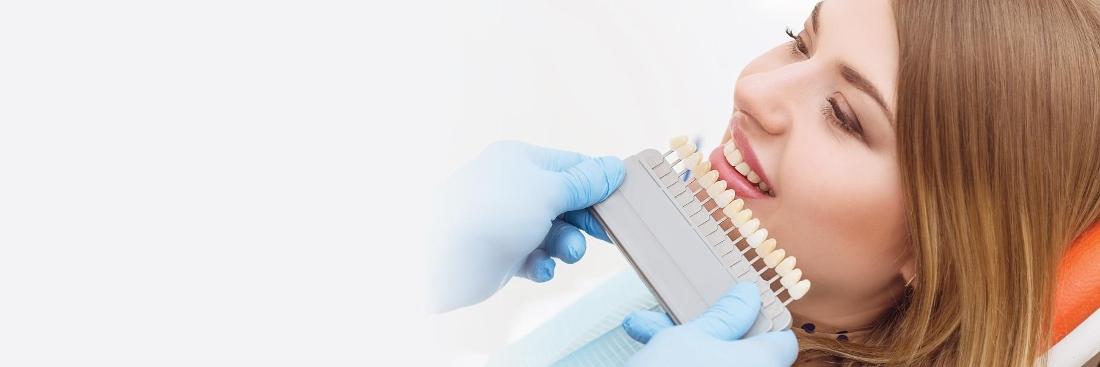 woman getting teeth whitened | Dentist Gretna LA